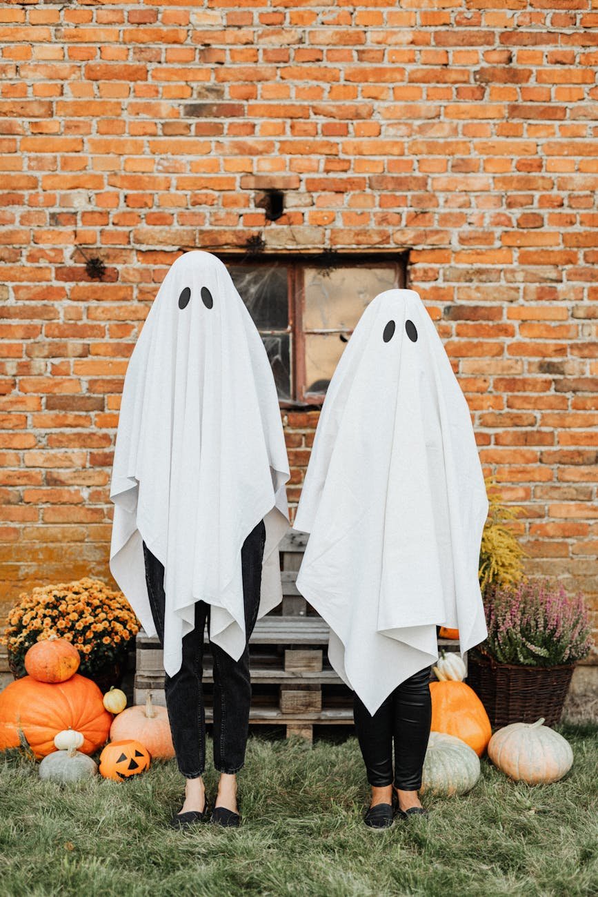 people dressed as ghosts