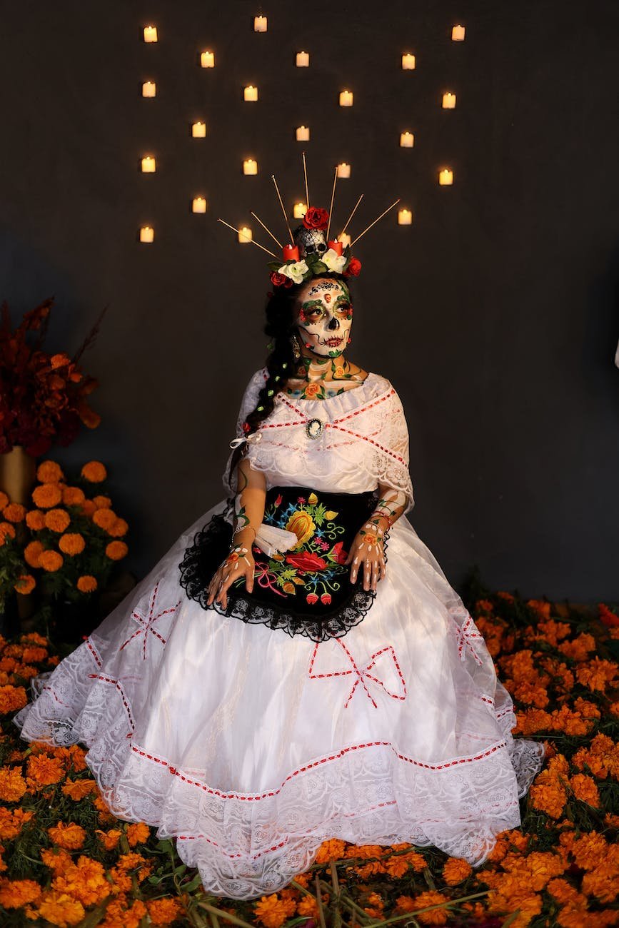 woman in traditional clothing and halloween makeup