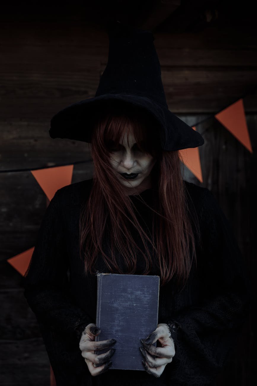 witch holder her spell book