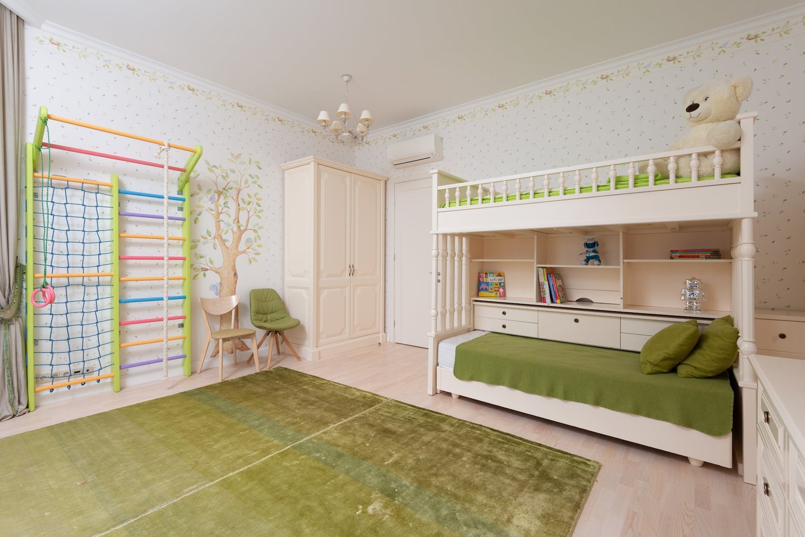 spacious children bedroom with green carpet and swedish wall